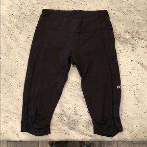 Lululemon Black Crops - ruffled stitching + pocket